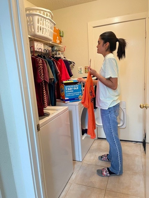 Victoria Delagarza doing laundry
